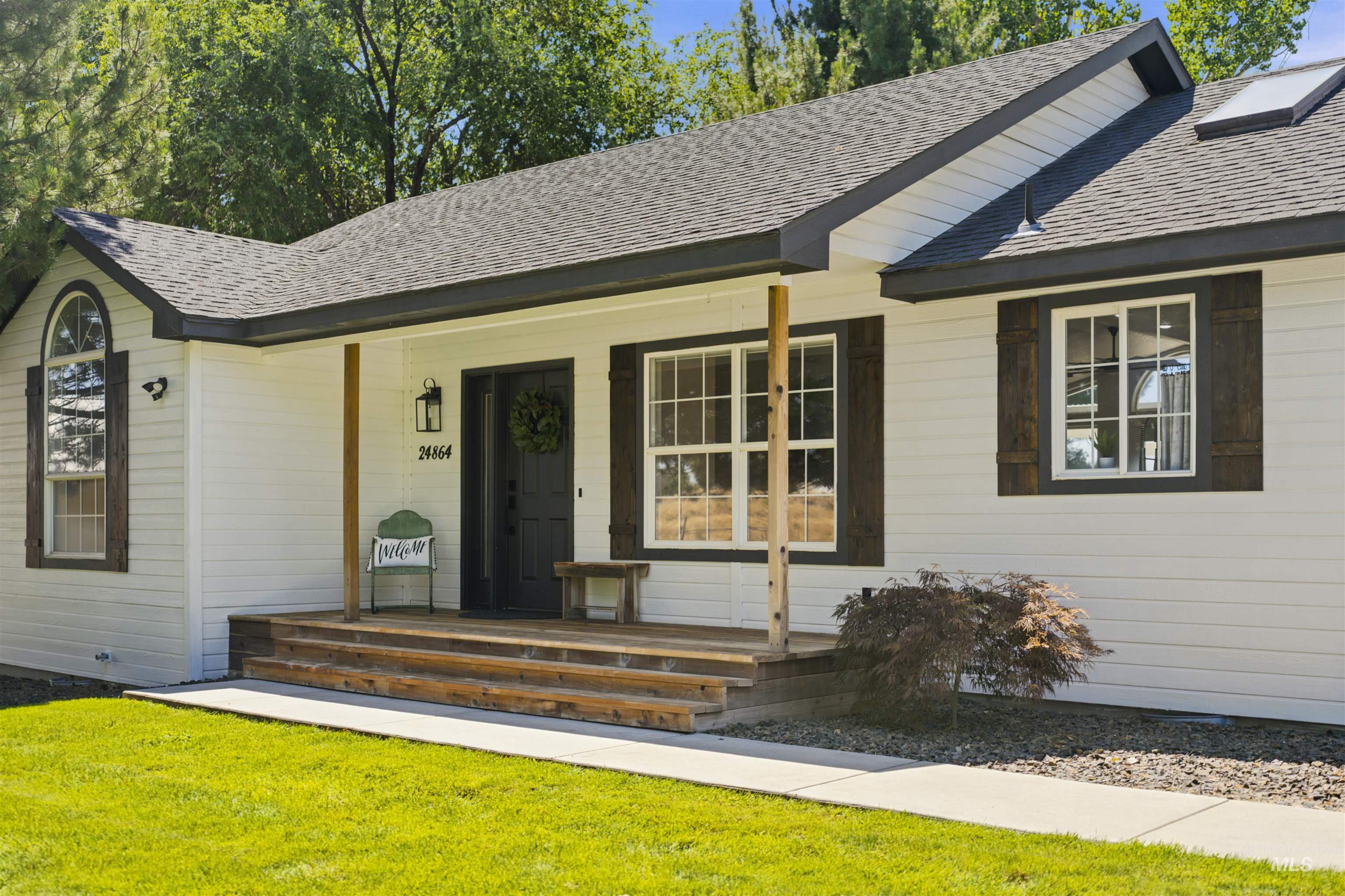 24864 Coventry Drive Caldwell, ID 83607 - Photo 38 of 49 White board and batten siding with contrasting dark trim