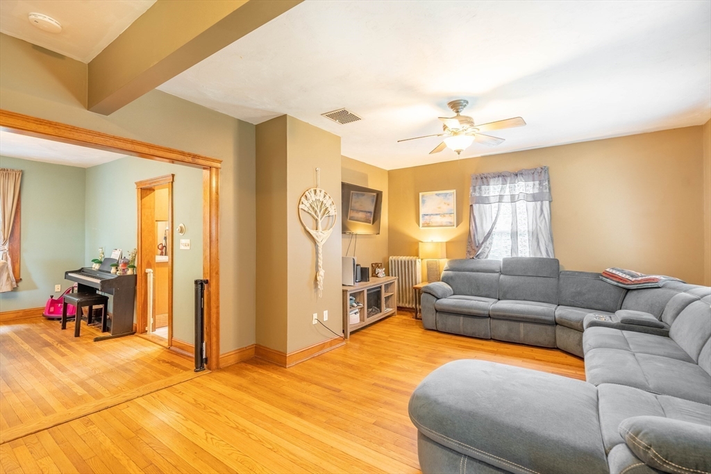 4 Walnut Street Brookfield, MA 01506 - Photo 15 of 33 a living room with furniture and a flat screen tv