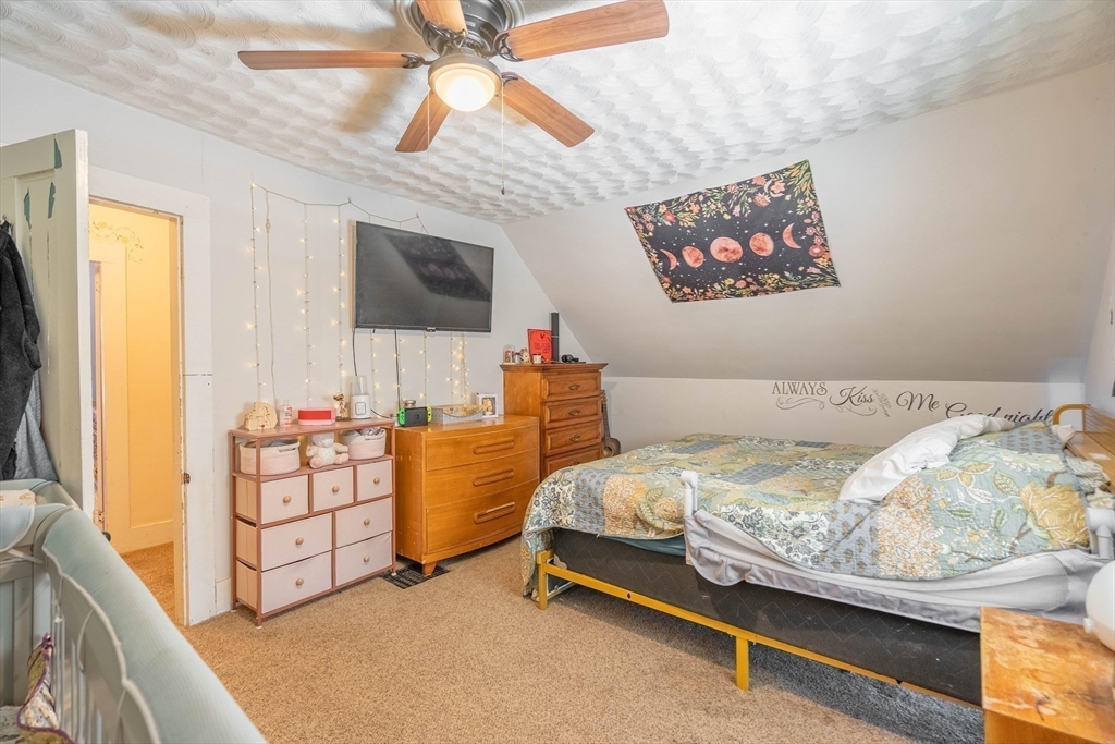 4 Walnut Street Brookfield, MA 01506 - Photo 18 of 33 a bedroom with bed and a window