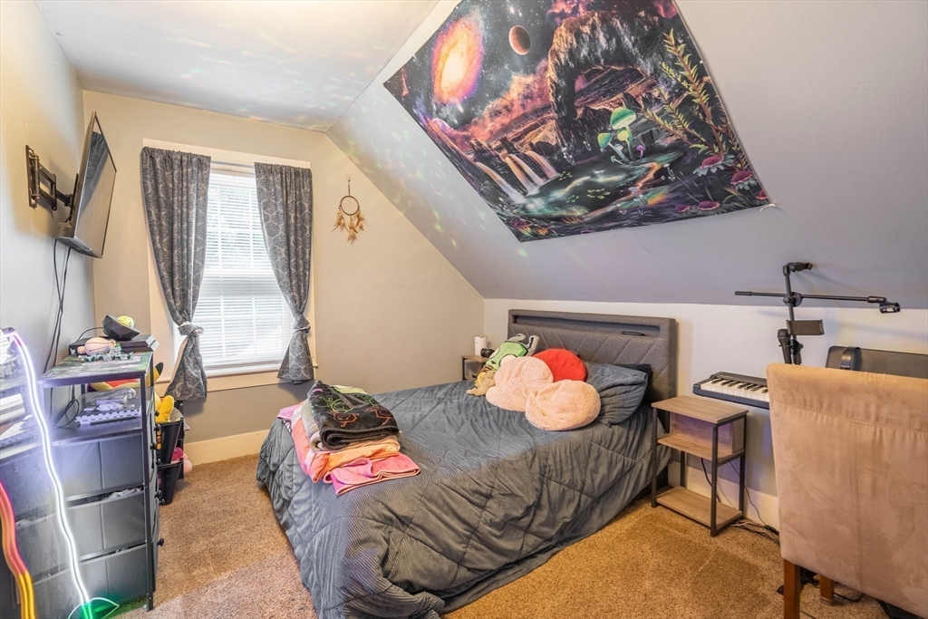 4 Walnut Street Brookfield, MA 01506 - Photo 20 of 33 a bedroom with furniture and a bed