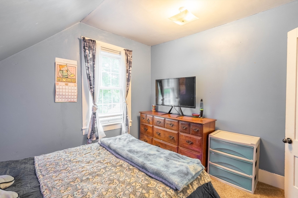 4 Walnut Street Brookfield, MA 01506 - Photo 22 of 33 a bedroom with a bed and a dresser in it