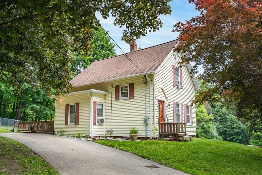 4 Walnut Street Brookfield, MA 01506 - Photo 3 of 33 a view of a yard in front of a house