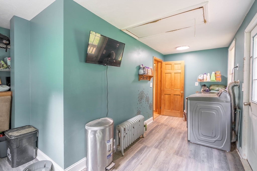 4 Walnut Street Brookfield, MA 01506 - Photo 8 of 33 a room with furniture a flat screen tv and a window