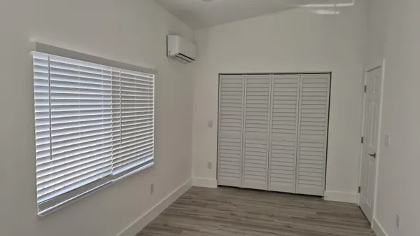 a view of a room that has a window in it