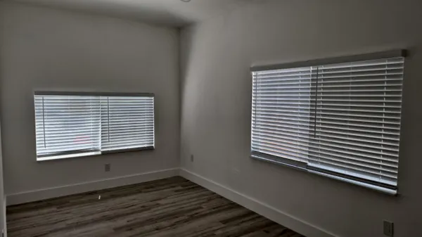 a view of a room that has a window