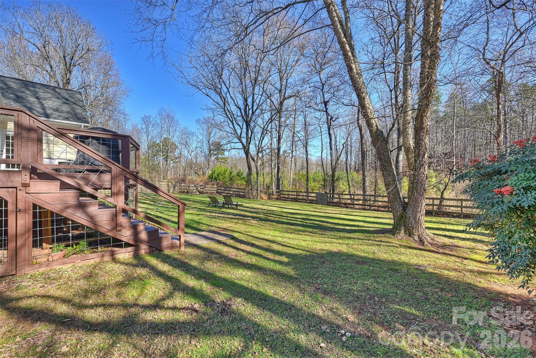 15346 Yarmouth Road Mint Hill, NC 28227 - Photo 36 of 43 a view of backyard with deck and seating area