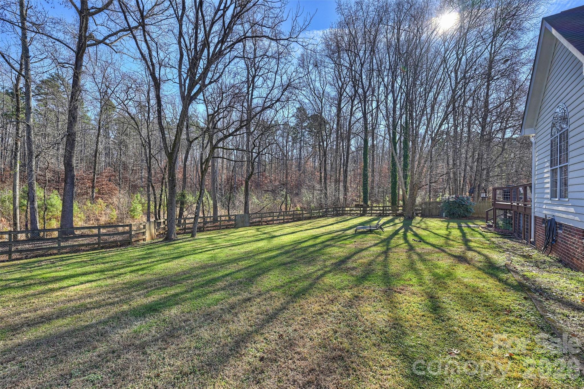 15346 Yarmouth Road Mint Hill, NC 28227 - Photo 38 of 43 a view of a backyard with swimming pool