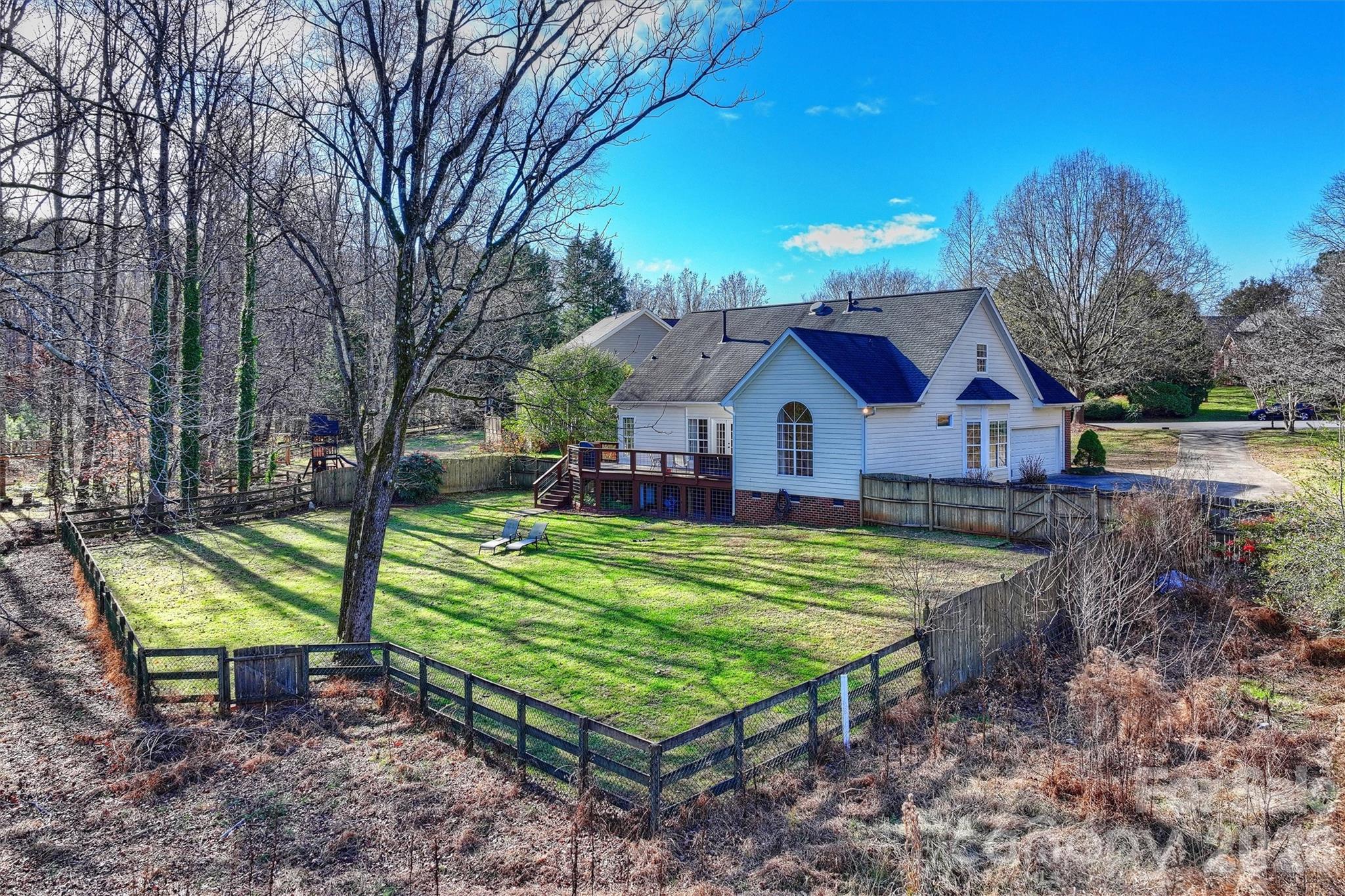 15346 Yarmouth Road Mint Hill, NC 28227 - Photo 39 of 43 a front view of a house with garden