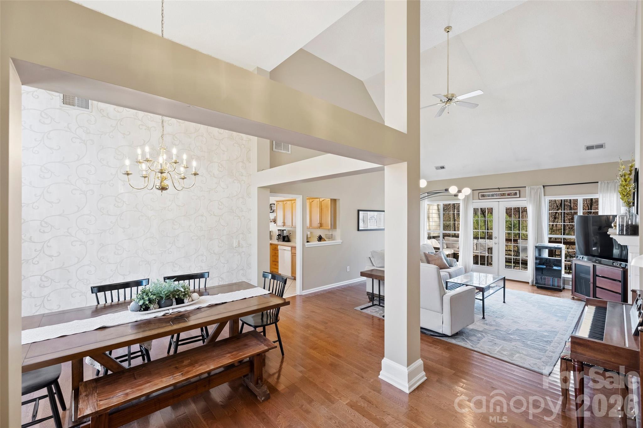 15346 Yarmouth Road Mint Hill, NC 28227 - Photo 4 of 43 a view of a livingroom with furniture wooden floor and a chandelier