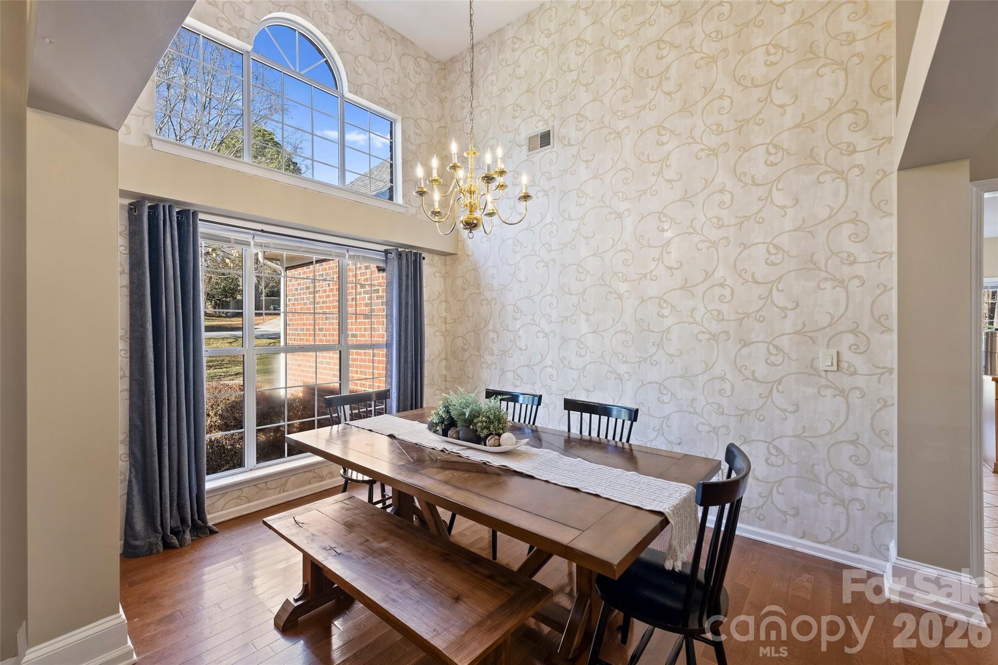 15346 Yarmouth Road Mint Hill, NC 28227 - Photo 7 of 43 a view of a dining room with furniture window and wooden floor