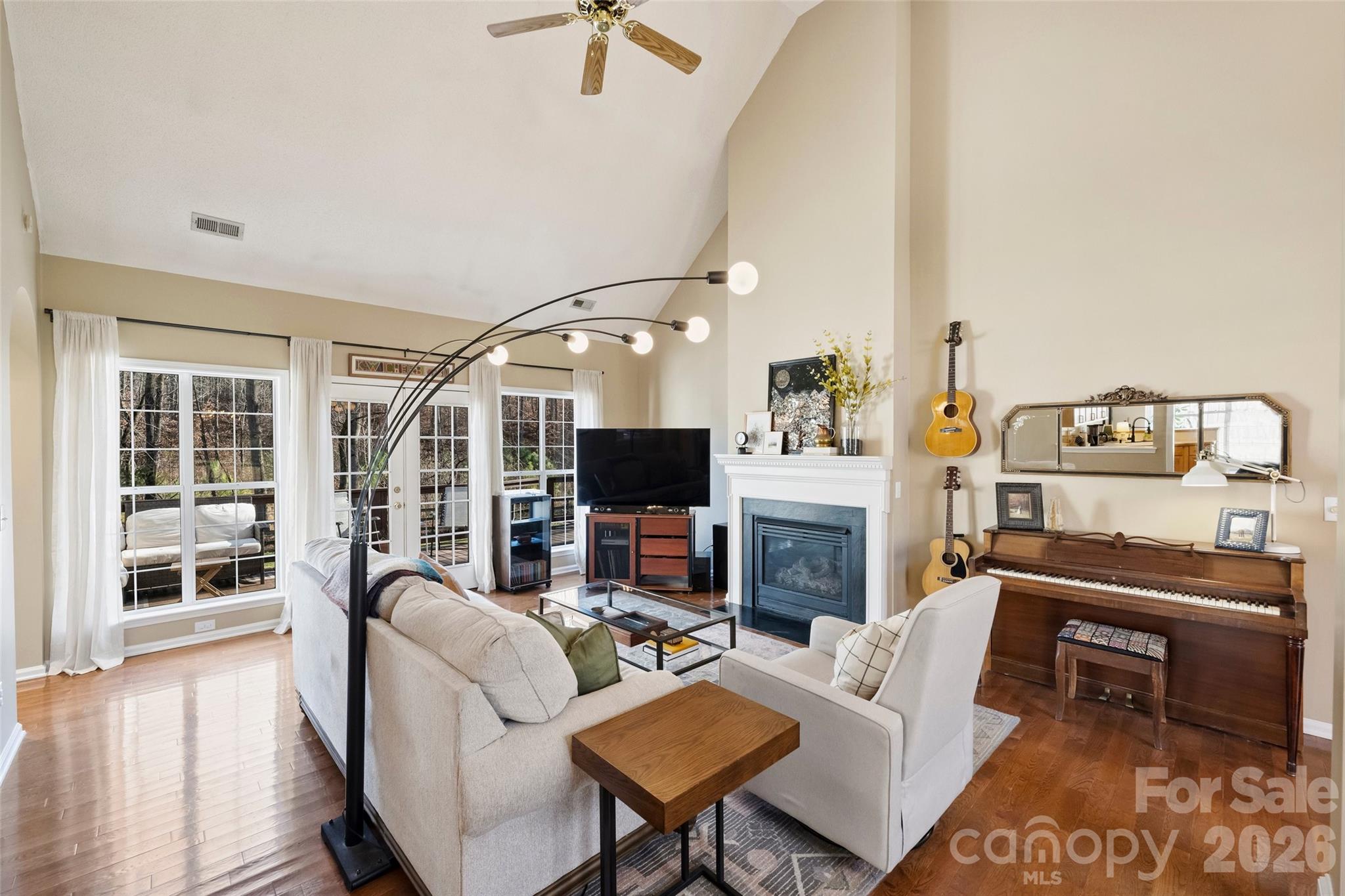 15346 Yarmouth Road Mint Hill, NC 28227 - Photo 8 of 43 a living room with fireplace furniture and a flat screen tv