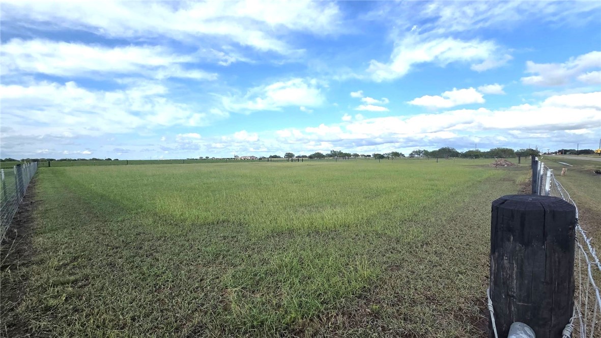 0 County Road Bishop, TX 78343 - Photo 1 of 7 a view of a lake with a big yard