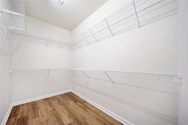a view of a room with racks on the wall