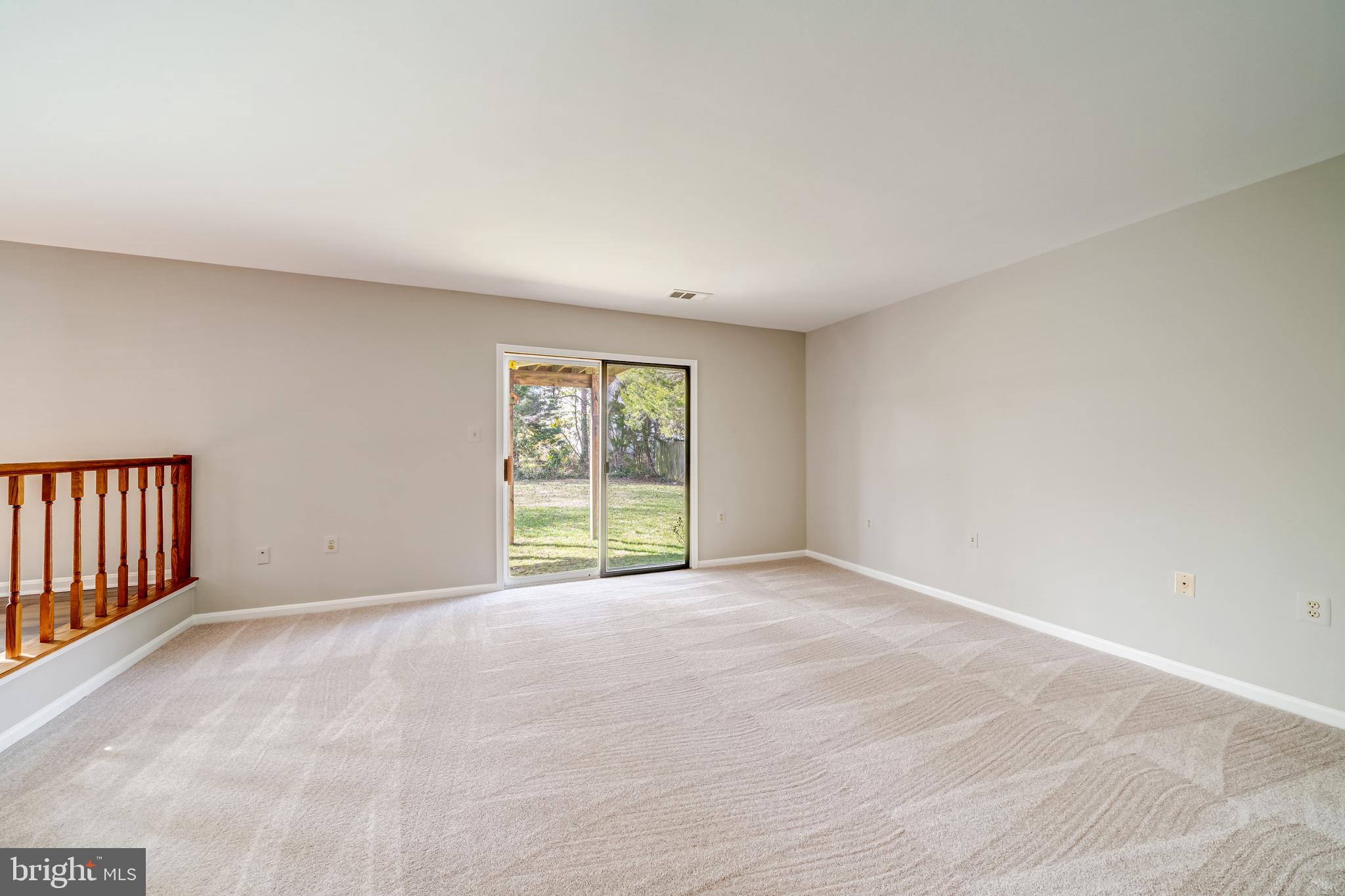 4014 A Ridge Road Annandale, VA 22003 - Photo 22 of 47 FAMILY ROOM WITH SLIDER TO THE BACKYARD