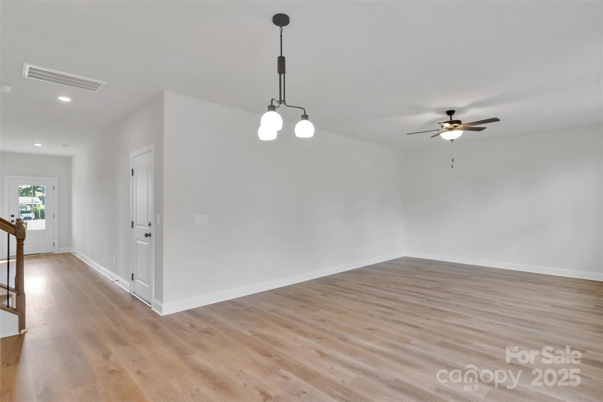 1809 Country Club Road, Unit 3 Lincolnton, NC 28092 - Photo 18 of 43 a view of a room with wooden floor and a ceiling fan