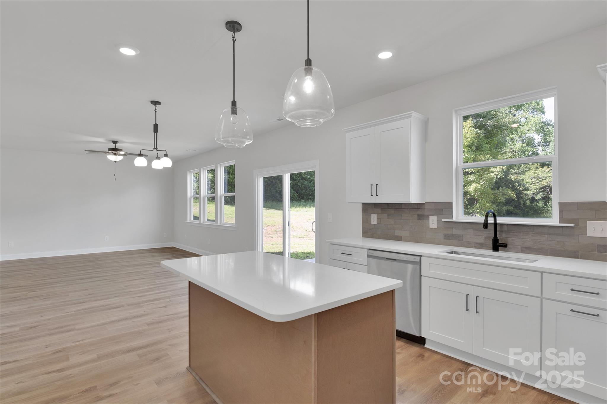 1809 Country Club Road, Unit 3 Lincolnton, NC 28092 - Photo 21 of 43 a kitchen with sink cabinets and window