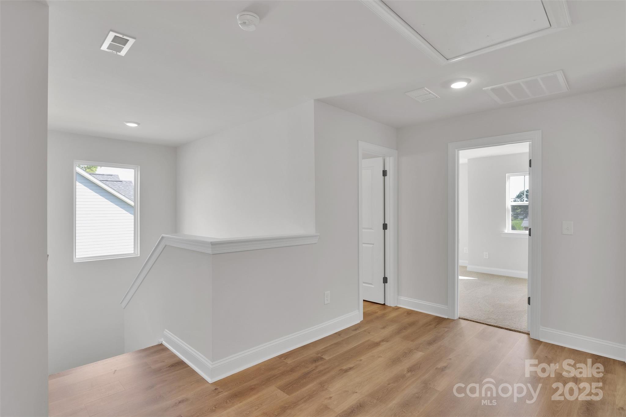 1809 Country Club Road, Unit 3 Lincolnton, NC 28092 - Photo 27 of 43 an empty room with windows and closet
