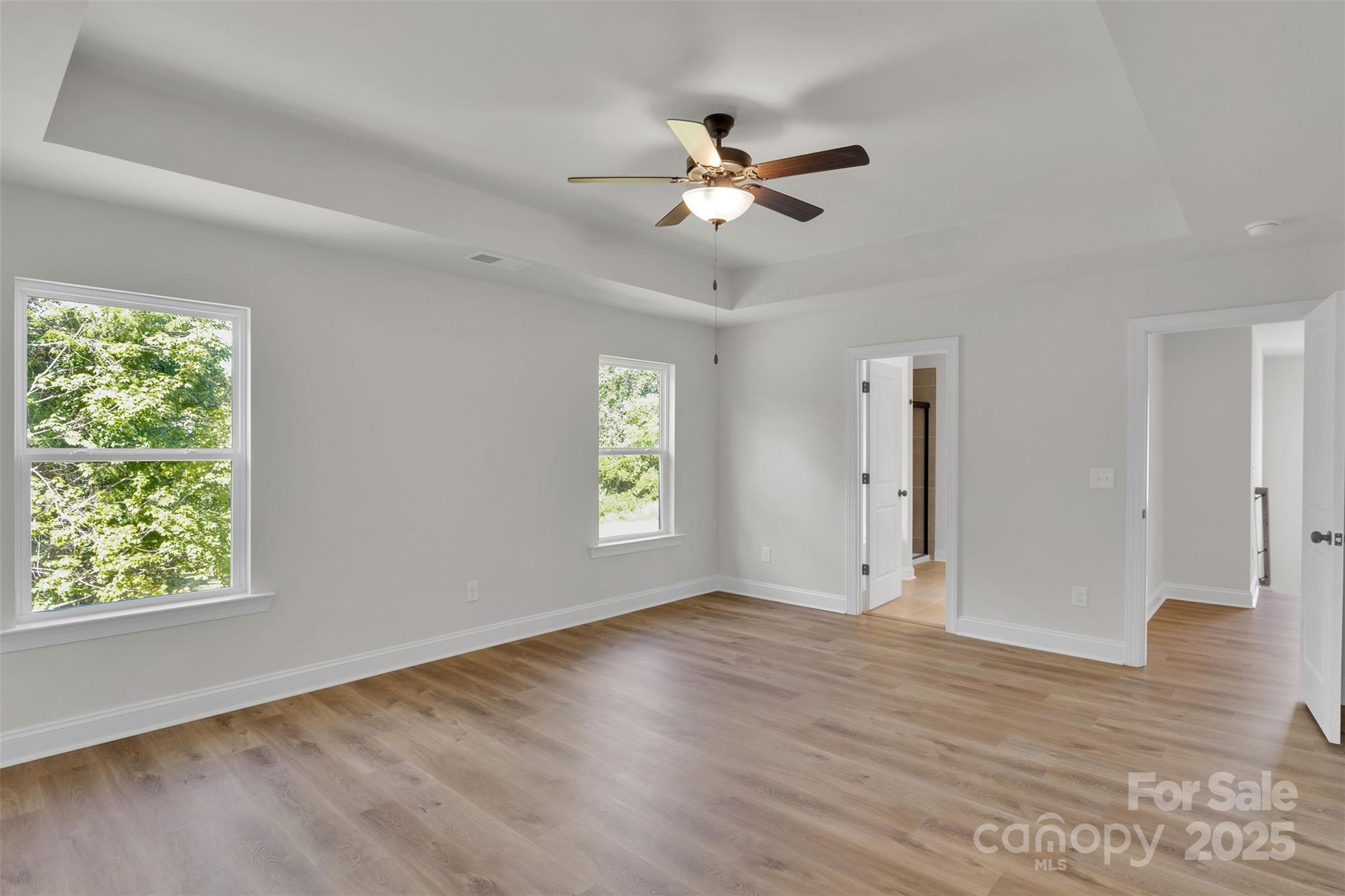 1809 Country Club Road, Unit 3 Lincolnton, NC 28092 - Photo 30 of 43 a view of an empty room with wooden floor and a window