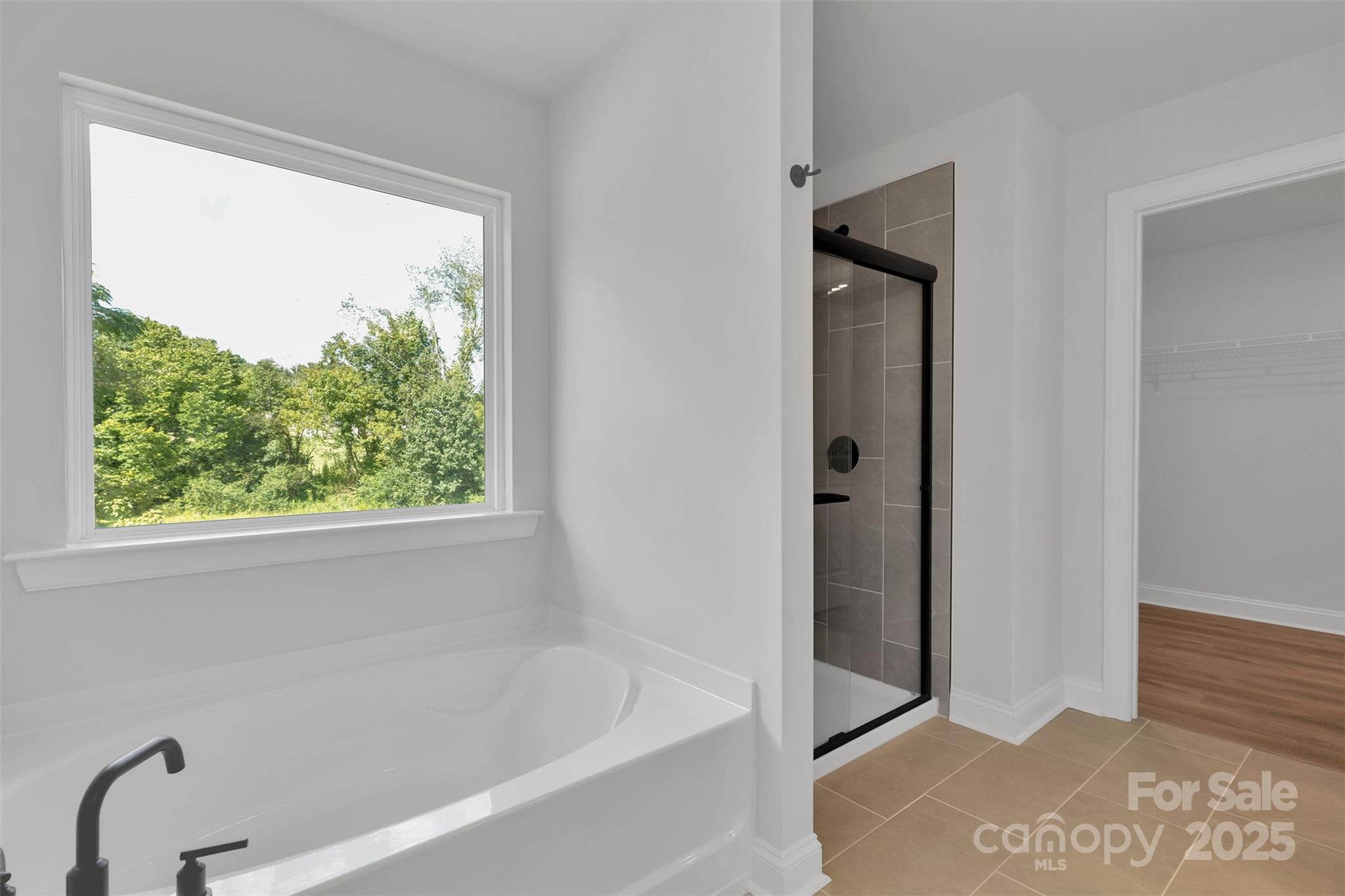 1809 Country Club Road, Unit 3 Lincolnton, NC 28092 - Photo 32 of 43 a bathroom with a bathtub and a shower