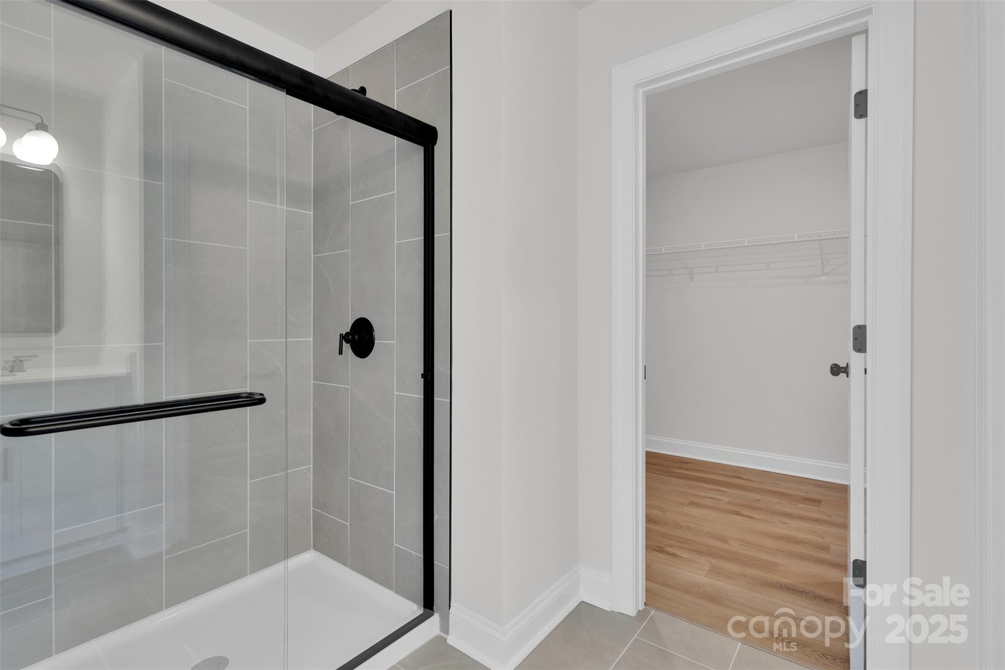 1809 Country Club Road, Unit 3 Lincolnton, NC 28092 - Photo 33 of 43 a bathroom with a glass shower door