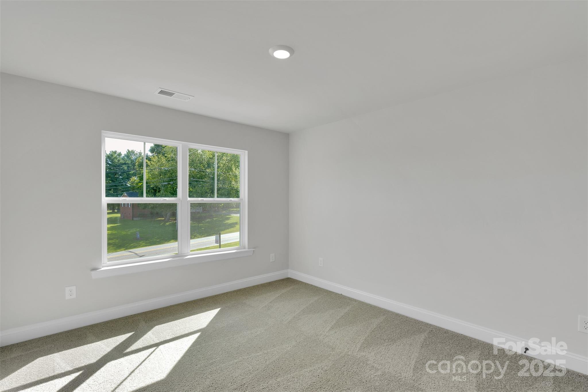 1809 Country Club Road, Unit 3 Lincolnton, NC 28092 - Photo 38 of 43 an empty room with a window