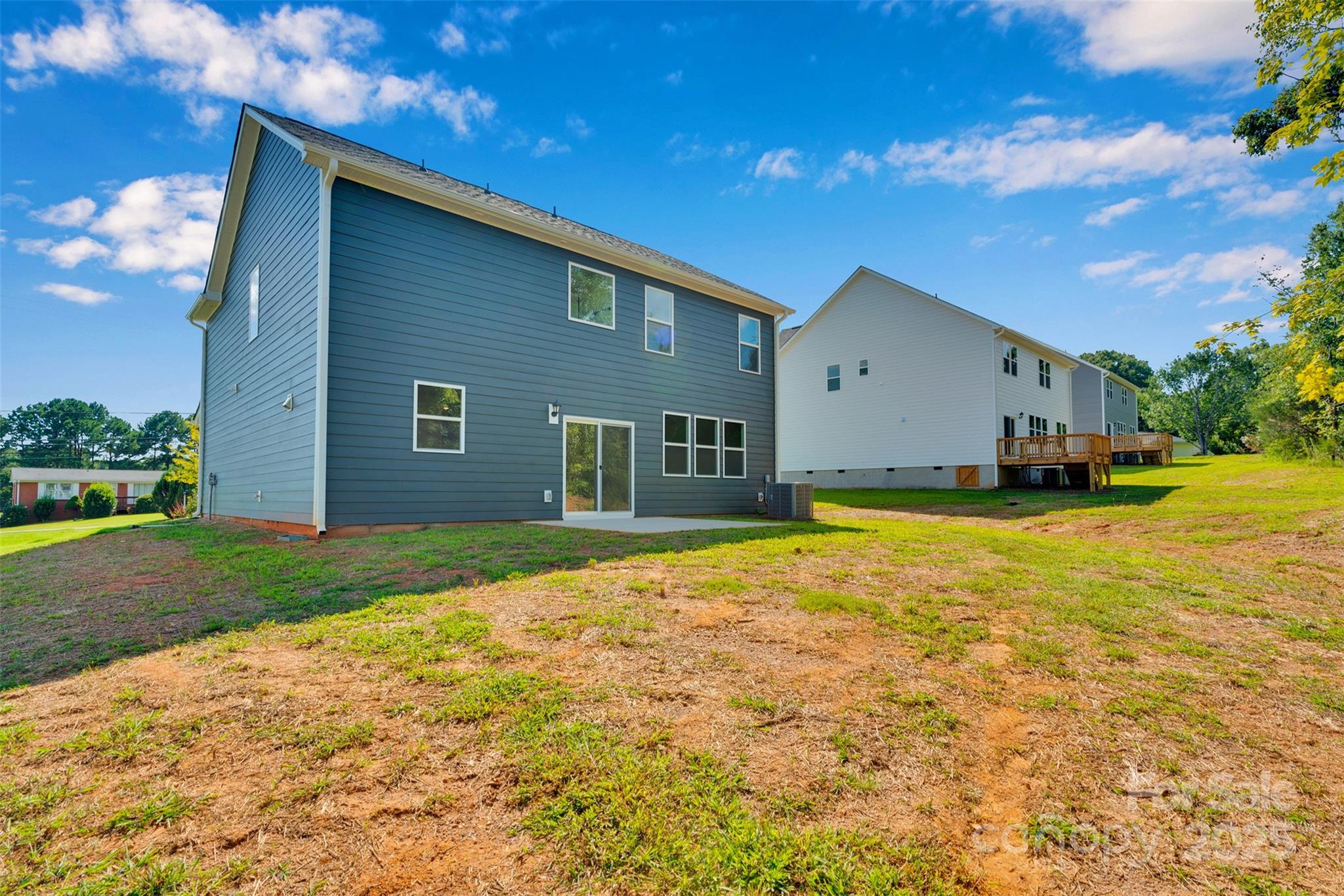 1809 Country Club Road, Unit 3 Lincolnton, NC 28092 - Photo 5 of 43 a front view of house with yard and trees