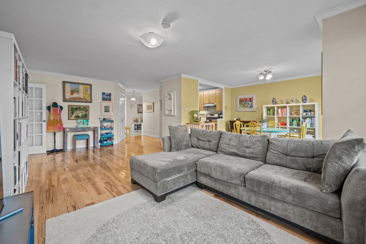 2500 Johnson Avenue, Unit 2NP Bronx, NY 10463 - Photo 10 of 45 a living room with furniture and a large window