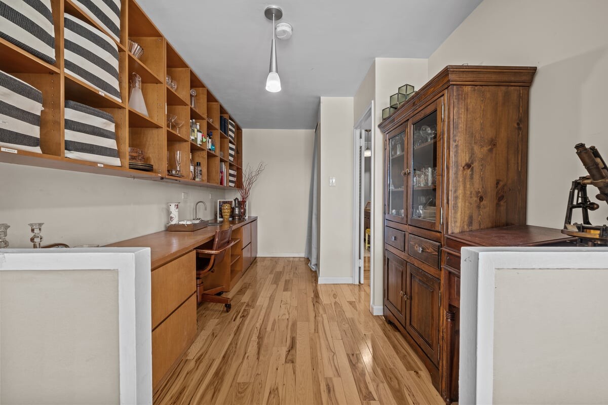 2500 Johnson Avenue, Unit 2NP Bronx, NY 10463 - Photo 14 of 45 a kitchen with granite countertop a sink and a refrigerator