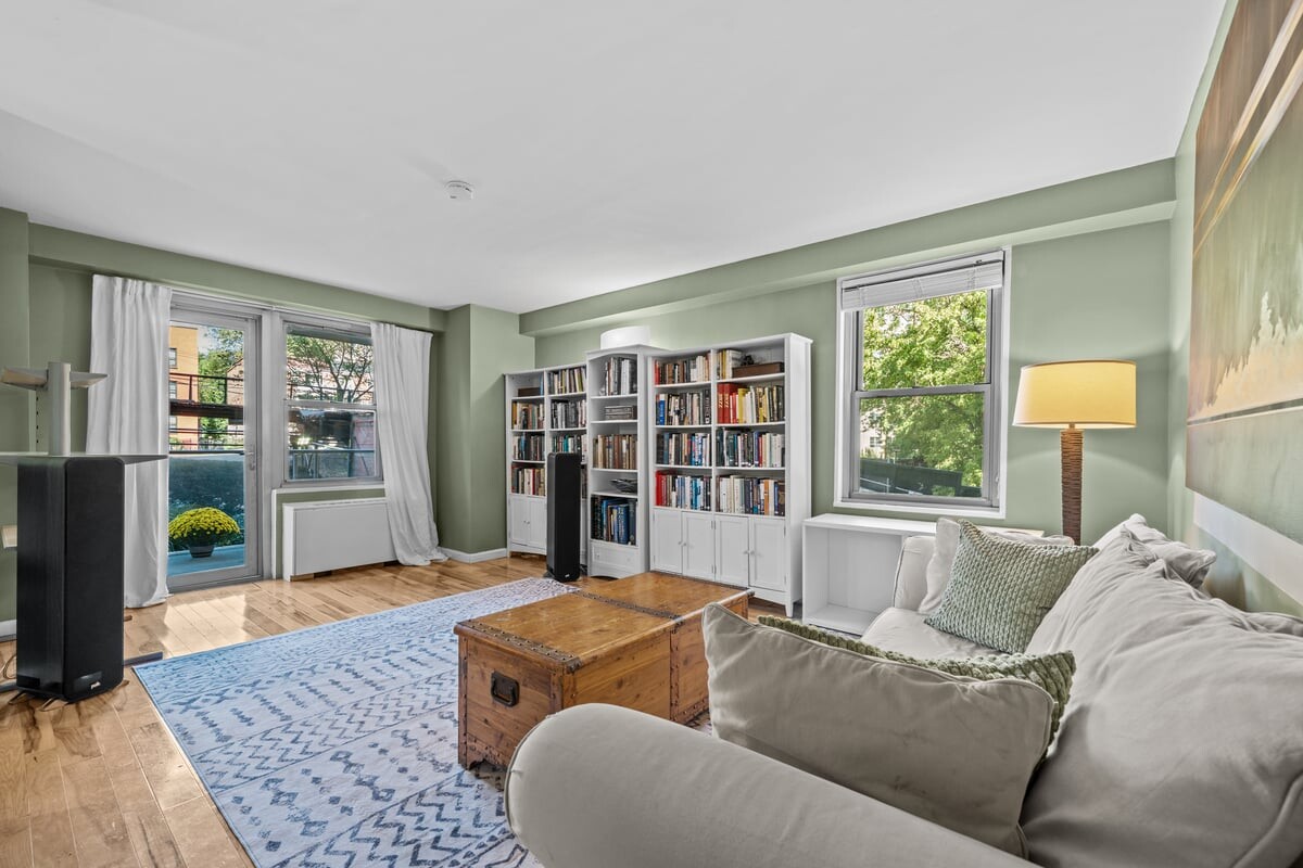 2500 Johnson Avenue, Unit 2NP Bronx, NY 10463 - Photo 15 of 45 a living room with furniture and a flat screen tv