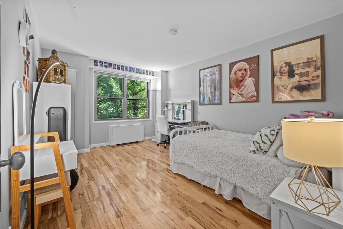 2500 Johnson Avenue, Unit 2NP Bronx, NY 10463 - Photo 25 of 45 a bedroom with a bed and a window