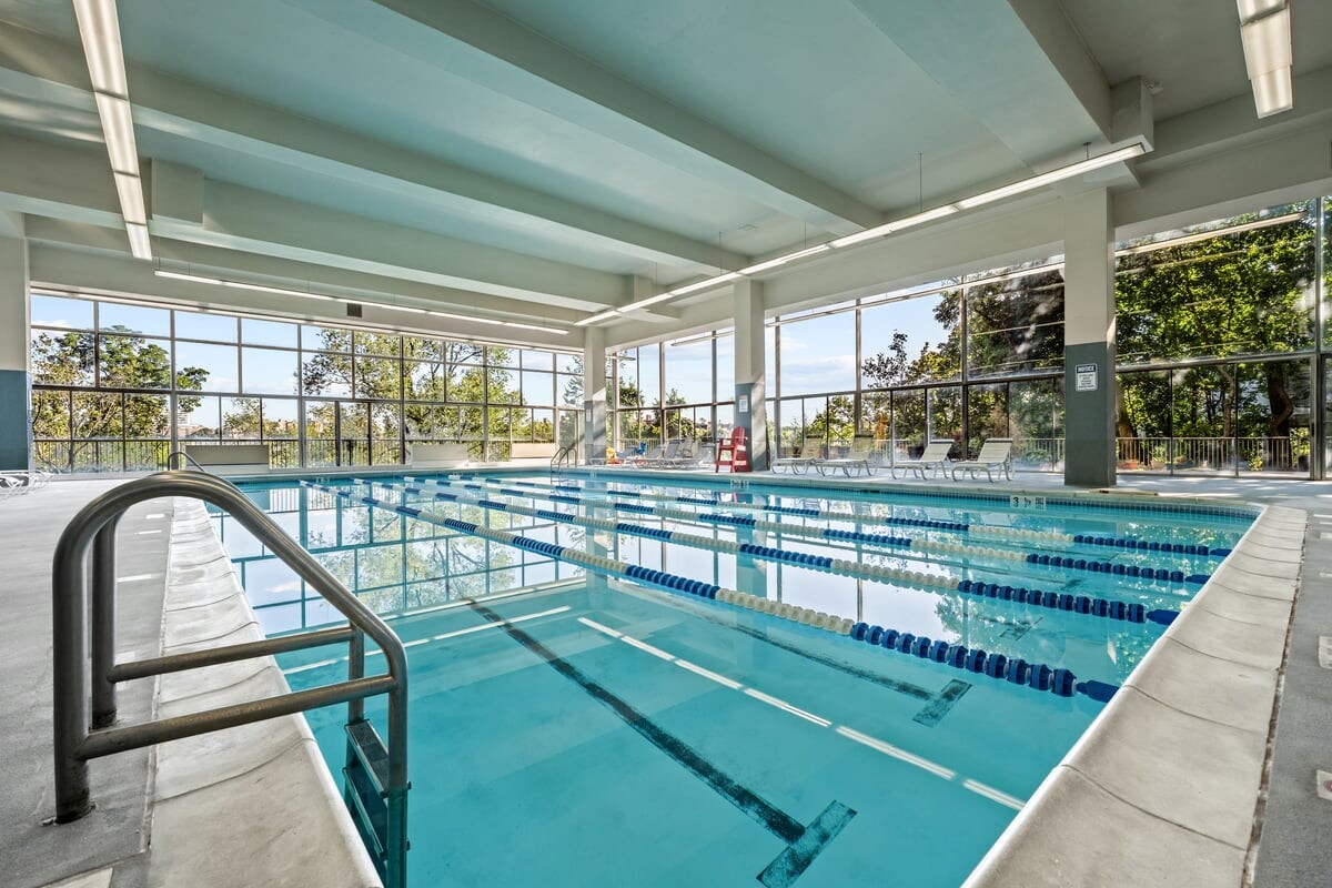 2500 Johnson Avenue, Unit 2NP Bronx, NY 10463 - Photo 39 of 45 a view of a swimming pool with a porch and furniture