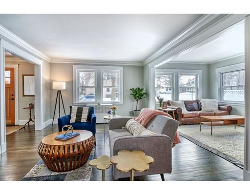 8 Enmore Road Melrose, MA 02176 - Photo 6 of 27 a living room with furniture and a large window