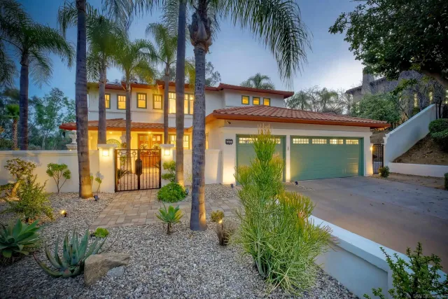 a view of a house with a garden