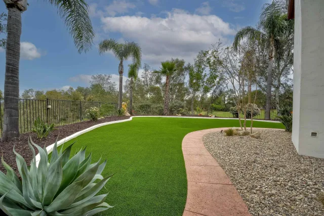 a view of a garden with a fountain