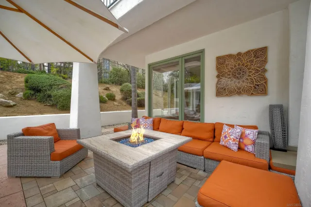 a outdoor living space with furniture and a couch