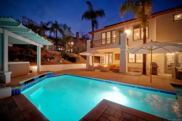 a view of a house with swimming pool