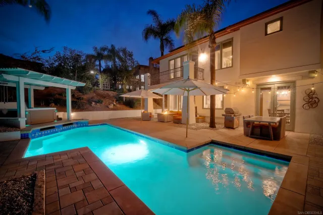 a view of a house with swimming pool