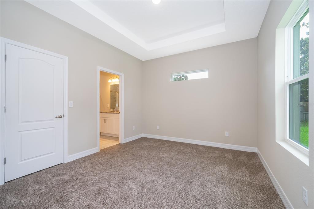 13805 Southwest 43rd Circle Ocala, FL 34473 - Photo 14 of 21 a view of an empty room with a window