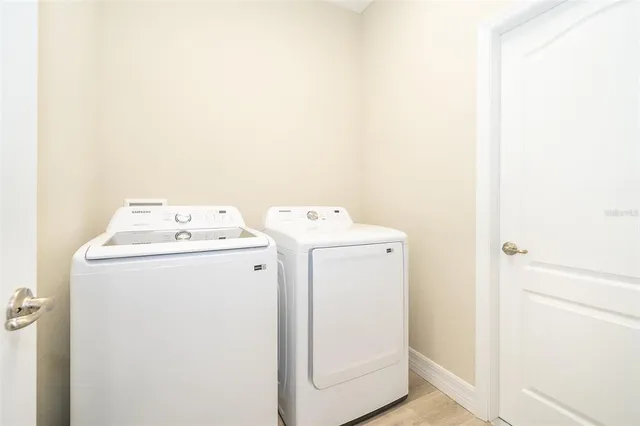 a utility room with dryer and washer