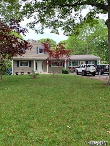 48 Roberts Road West Shirley, NY 11967 - Photo 1 of 1 a view of a house with a big yard