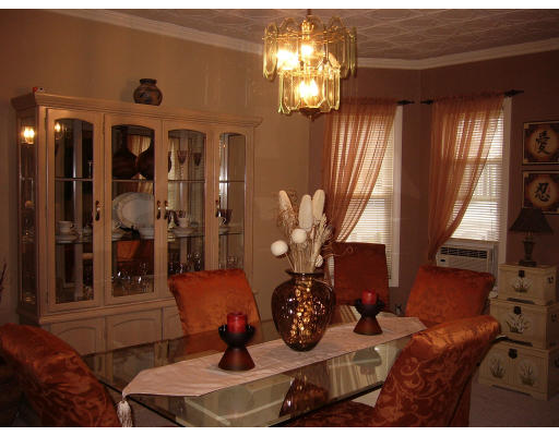 561 Division Street Fall River, MA 02721 - Photo 3 of 5 image of a livingroom with furniture and a large window