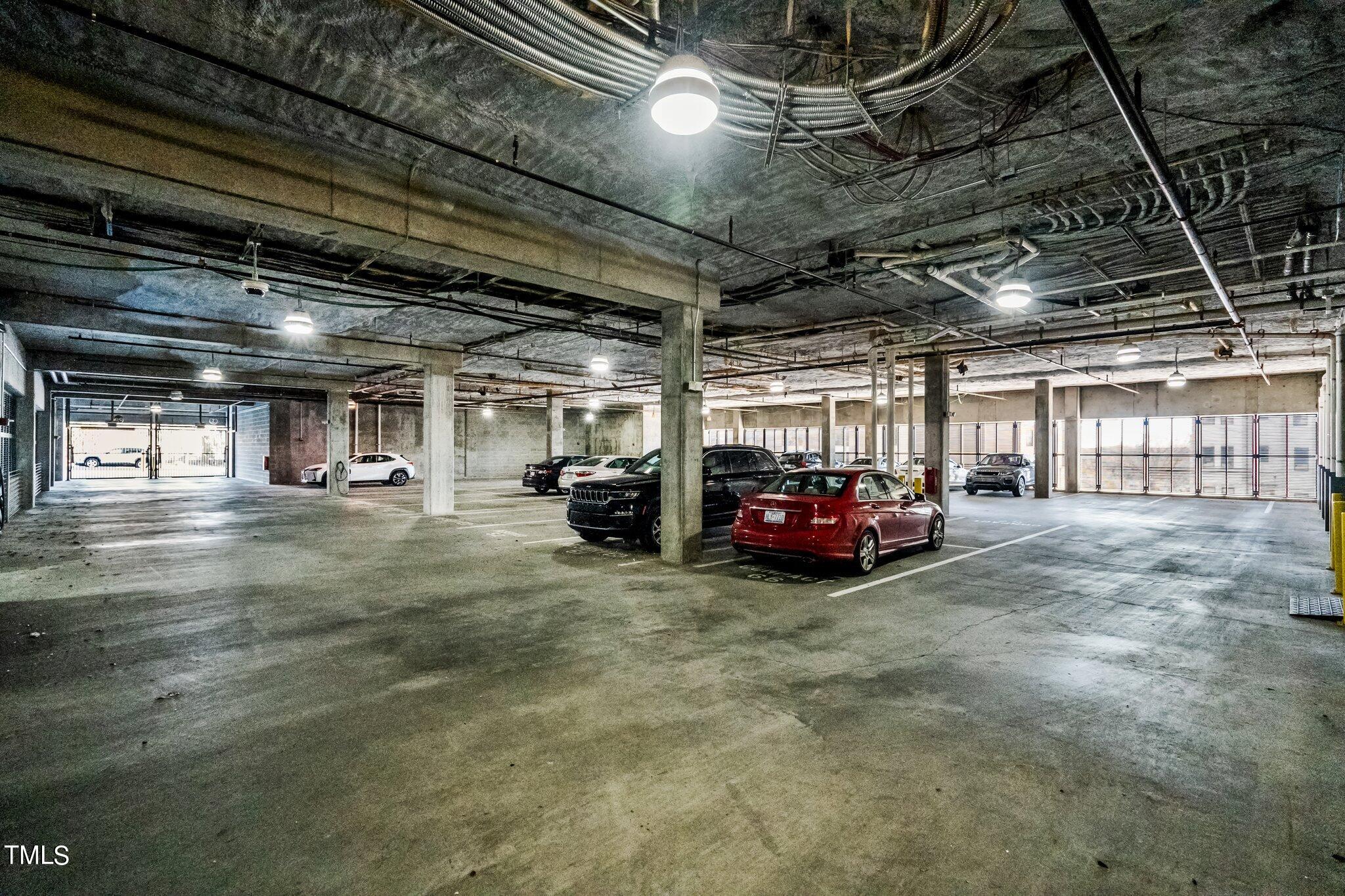523 South West Street, Unit 304 Raleigh, NC 27601 - Photo 20 of 23 a view of car parking