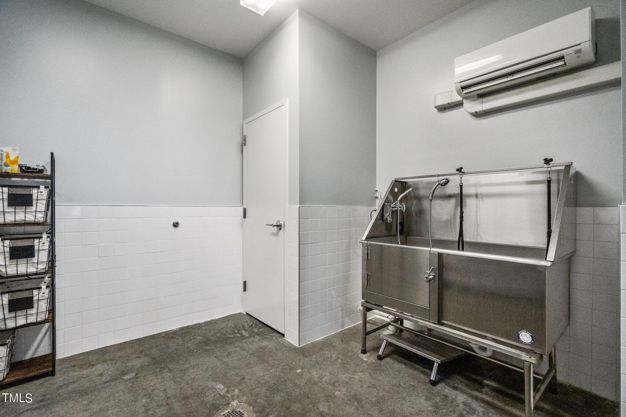 523 South West Street, Unit 304 Raleigh, NC 27601 - Photo 22 of 23 a utility room with dryer and washer