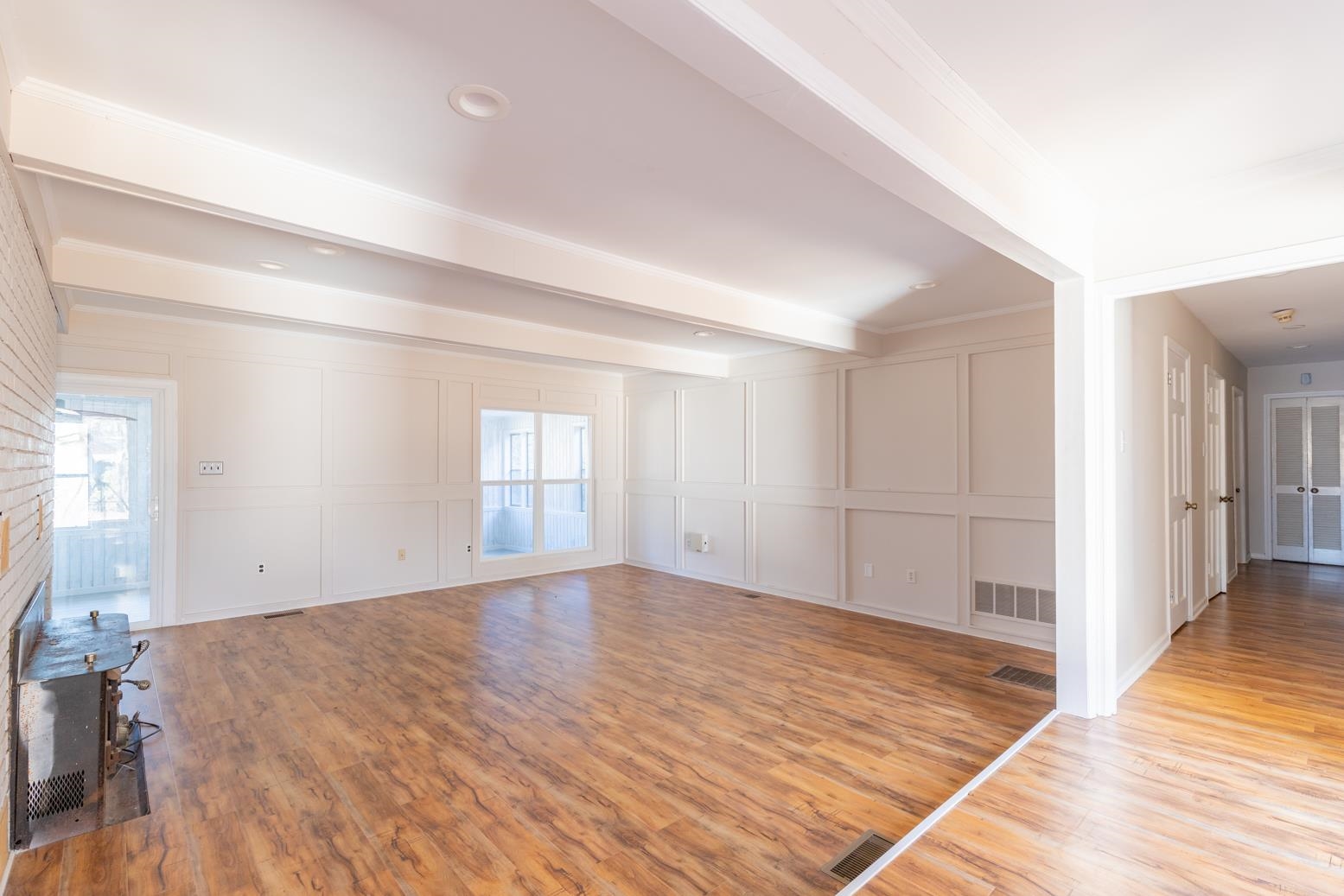 415 Key Road Collierville, TN 38017 - Photo 15 of 40 wooden floor in an empty room with a window