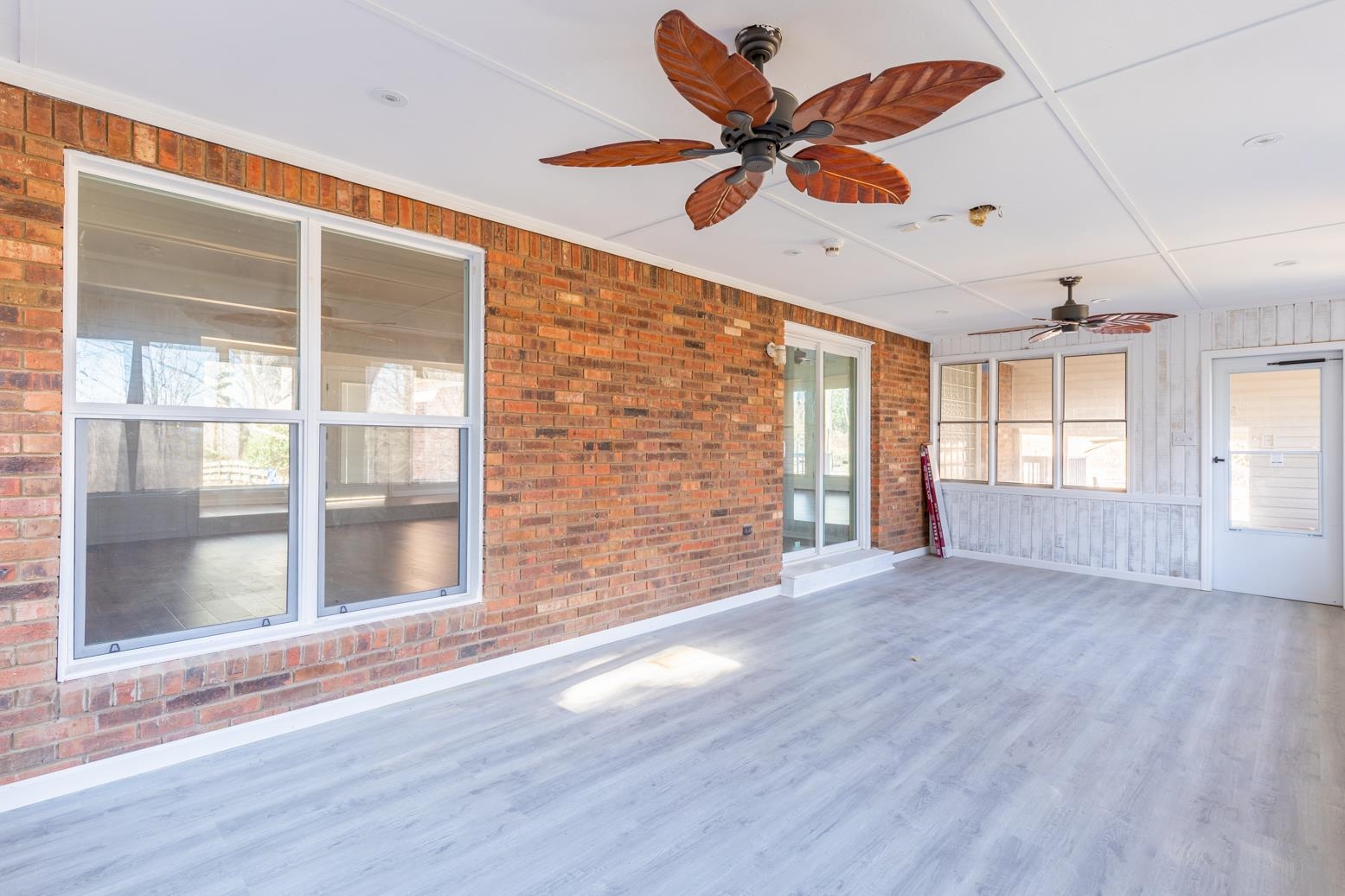 415 Key Road Collierville, TN 38017 - Photo 22 of 40 a view of an empty room with a window and wooden floor