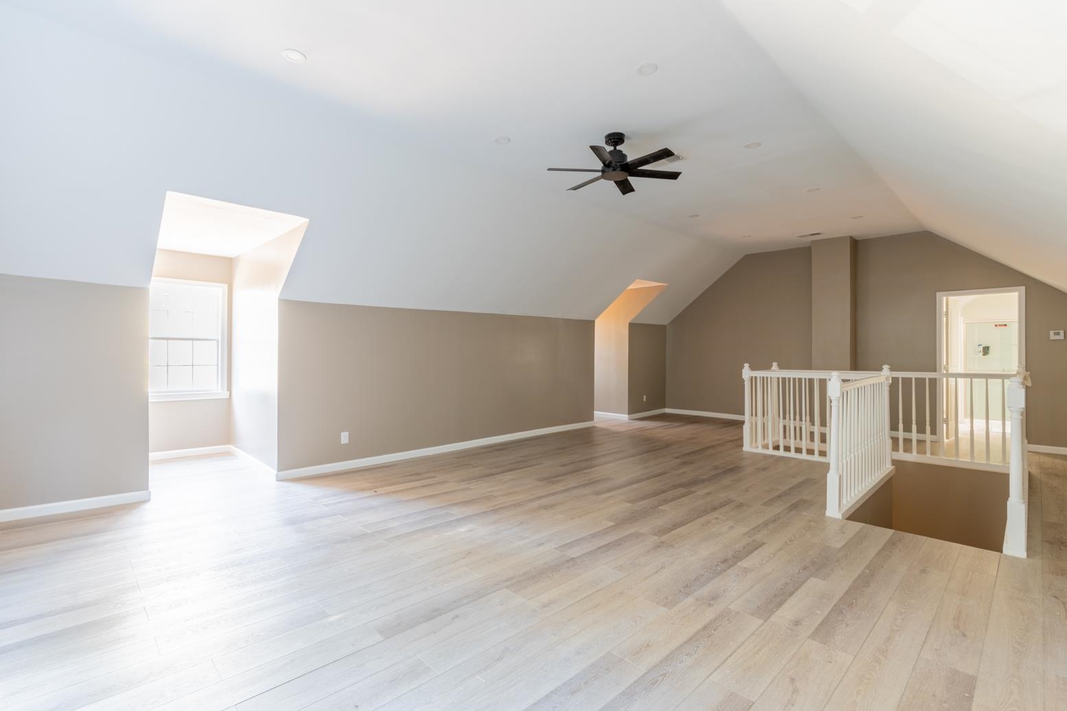 415 Key Road Collierville, TN 38017 - Photo 25 of 40 an empty room with wooden floor and windows