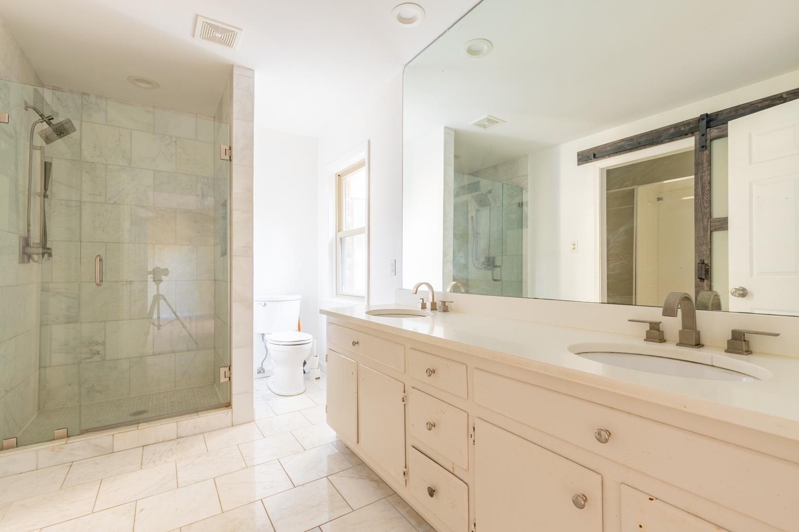 415 Key Road Collierville, TN 38017 - Photo 28 of 40 a bathroom with a shower sink and mirror