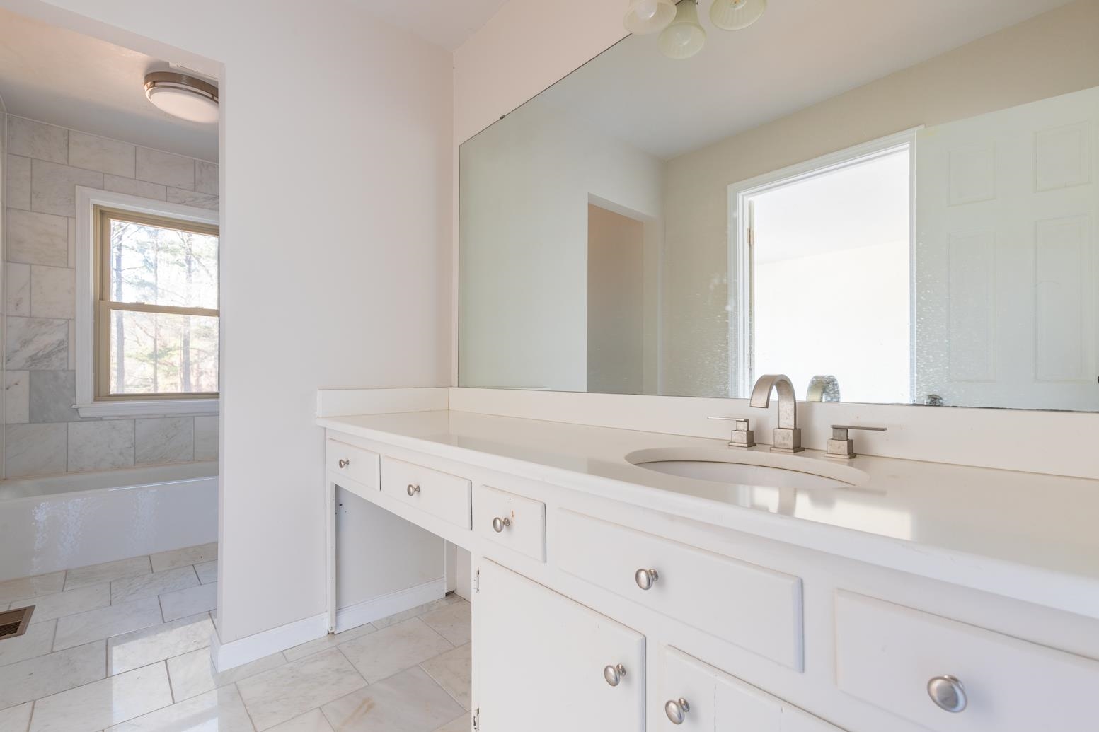 415 Key Road Collierville, TN 38017 - Photo 32 of 40 a bathroom with a sink and a mirror