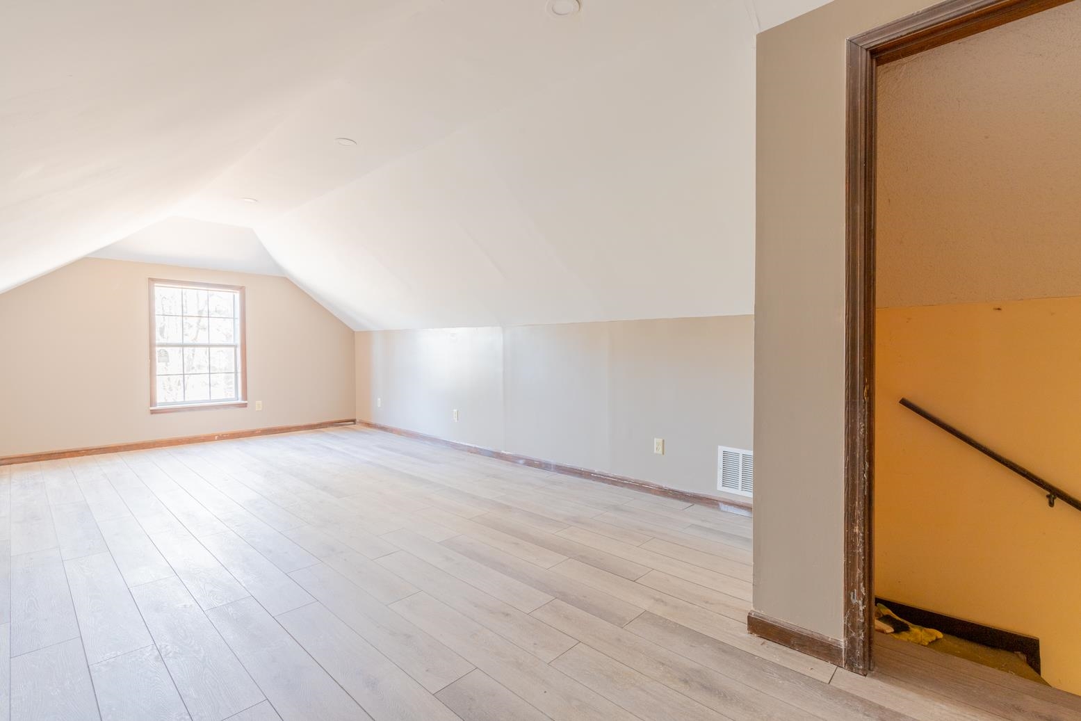 415 Key Road Collierville, TN 38017 - Photo 34 of 40 an empty room with wooden floor and windows