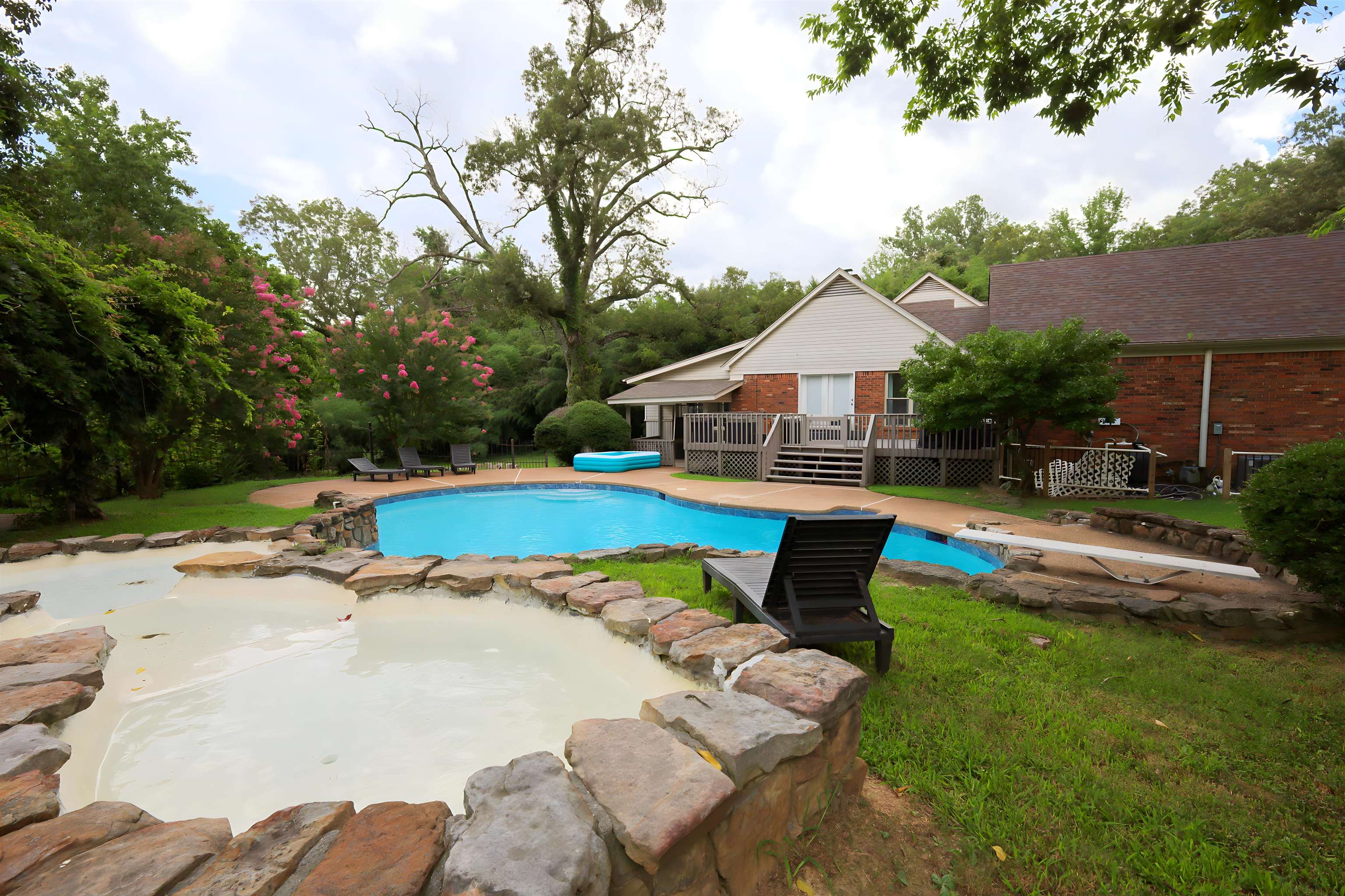 415 Key Road Collierville, TN 38017 - Photo 35 of 40 a view of backyard with swimming pool and seating space